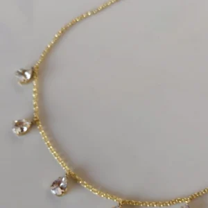 792550_65a510e4f0af4072930dbfcdf3b385f8mv2.webp Colar Zircônias Gota Cristal - CL106
